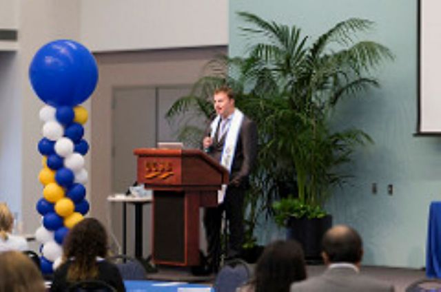 Luke Gordon speaking at TMP commencement 2014